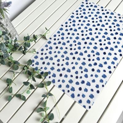 Fehér - kék tintafoltos alátét