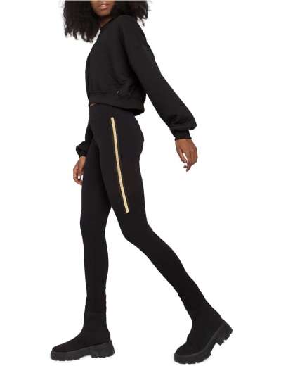fekete leggings bruna, a combján arany csíkkal