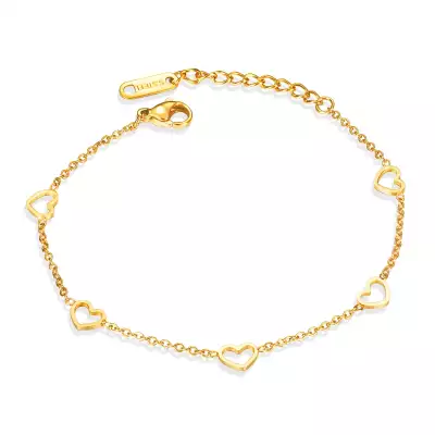 Acél karkötő arany színben, asszimetrikus szív kontúrral, ovális láncszemekkel