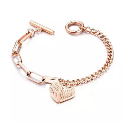 Acél karkötő réz színben - szív alakú angyalszárnyak