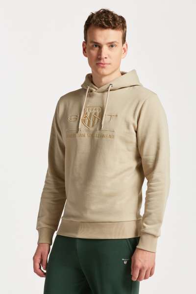 ELEGÍTŐ FELSŐ GANT REG TONAL SHIELD HOODIE CONCRETE BEIGE