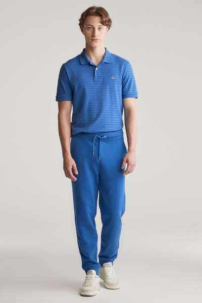 TRÉNINGNADRÁG GANT REG SHIELD SWEATPANTS RICH BLUE