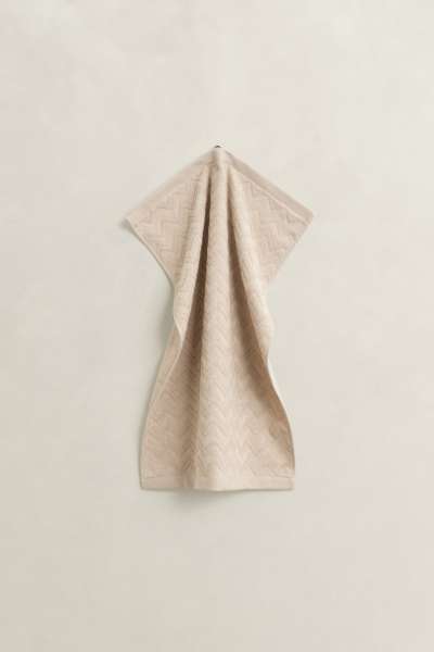 TÖRÜLKÖZŐ GANT JACQUARD HERRINGBONE TOWEL 50X70 FADED BEIGE