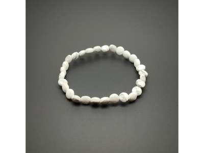 Howlit fazettált korong karkötő 6x4mm