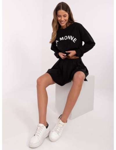 Fekete szett tenisz stílusú szoknyával