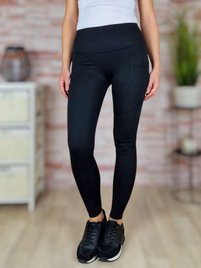 Gumis derekú, egyik oldalt zsebes, vékonyan bélelt fekete leggings S-M,M-L