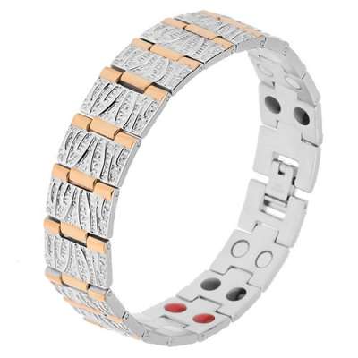 Acél karkötő ezüst és arany színben, dekoratív bemetszések, mágnesek 