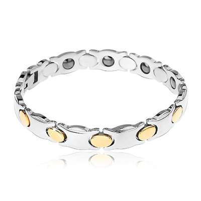 Keskenyebb acél karkötő, ezüst szín, oválisok arany árnyalatban, mágnesek