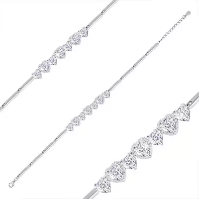 Ródiumozott karkötő 925 ezüstből, átlátszó cirkónia szívek, cirkóniás szív körvonalak