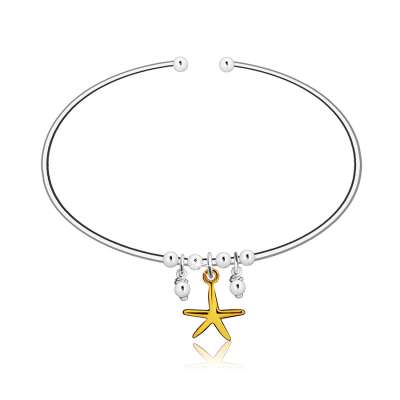 925 ezüst kerek felhúzható karperec – arany színű tengeri csillag, fényes golyók