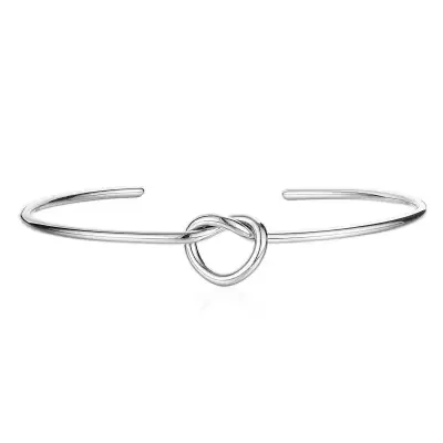 Kerek acél karkötő,szív alakú csomó, ezüst színű