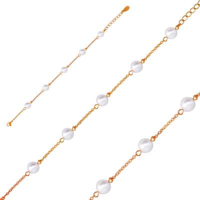 Karkötő réz színű acélból, fehér gyöngyökkel, finom lánccal