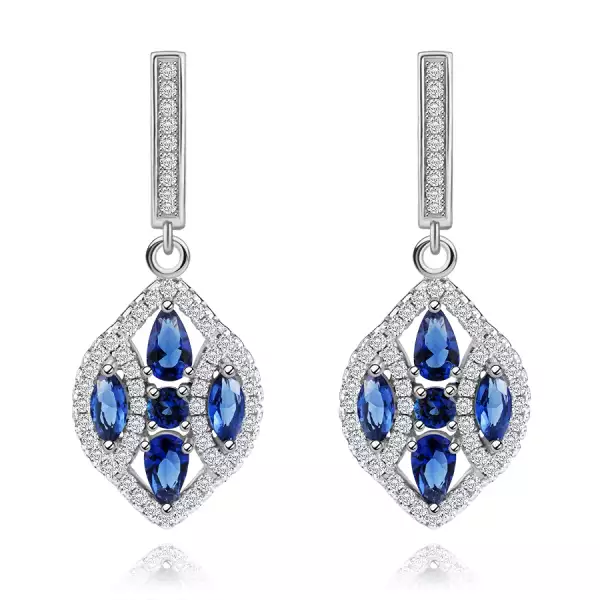 925 ezüst fülbevaló, széles búzaszem kék és átlátszó cirkóniákkal díszítve