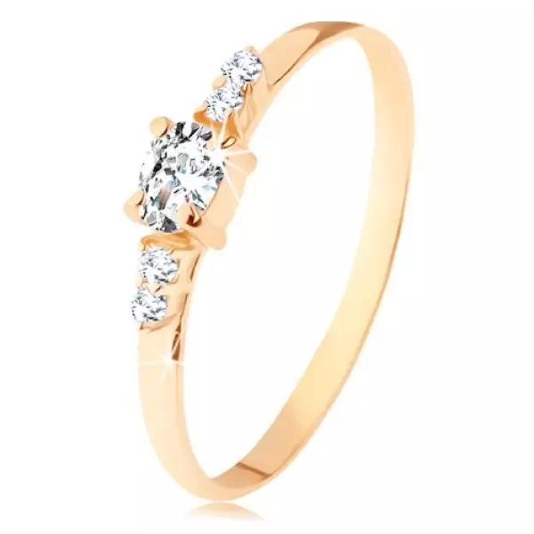 14K sárga színű arany gyűrű - átlátszó, ovális cirkóniás, dupla cirkóniával az oldalán - Nagyság_ 63