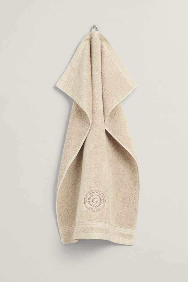 TÖRÜLKÖZŐ GANT CREST TOWEL 30X50 PUTTY