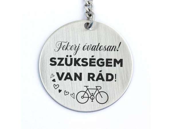 Tekerj óvatosan acél medálos kulcstartó
