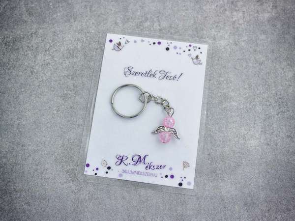 Szeretlek Tesó rózsaszín angyal medálos kulcstartó