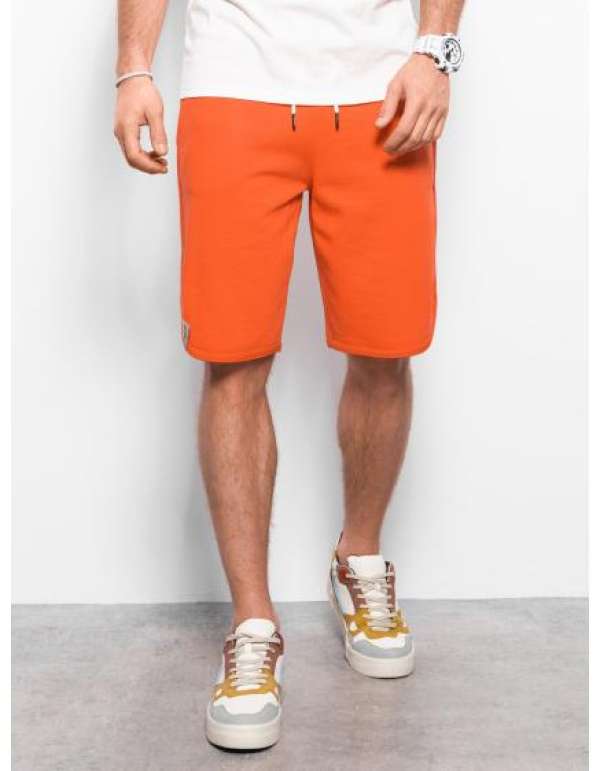 Férfi tréningnadrág V5 W360 narancssárga szegéllyel