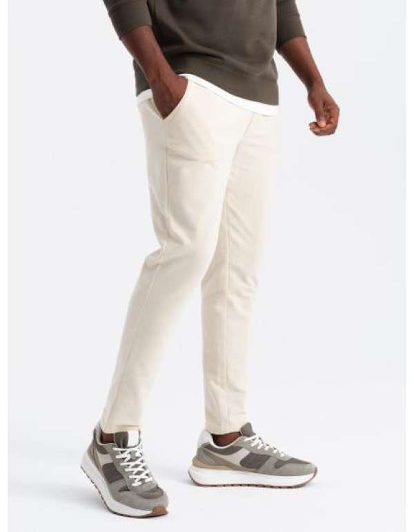 Férfi melegítőnadrág krémszínű logóval