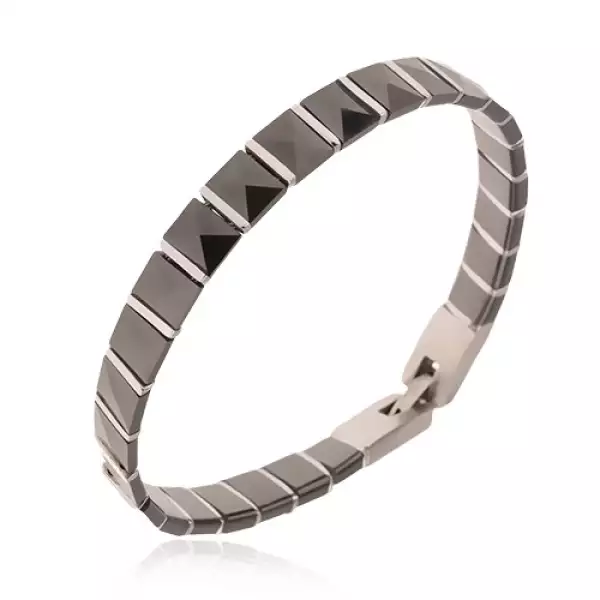 Fekete kerámia karkötő, piramis alakú részek, acél sávok