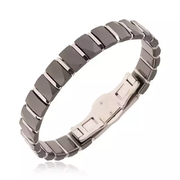 Fekete kerámia karkötő, csiszolt, hosszúkás részek, acél sávok