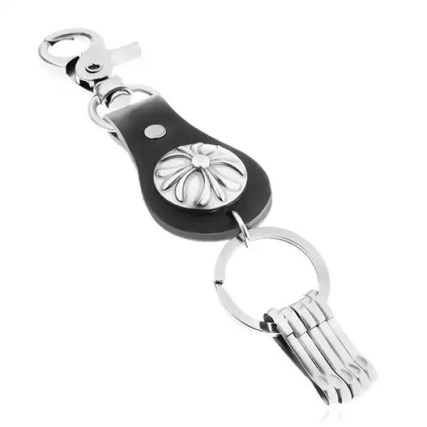 Patinált kulcstartó sötétszürke színben, ornamentumokkal