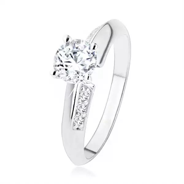 925 ezüst eljegyzési gyűrű, lemetszett szárak apró cirkóniákkal, átlátszó kő - Nagyság_ 52