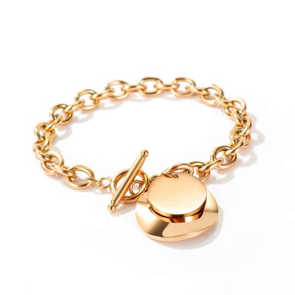 Acél karkötő réz színben - egy lapos és egy hullámos koronggal