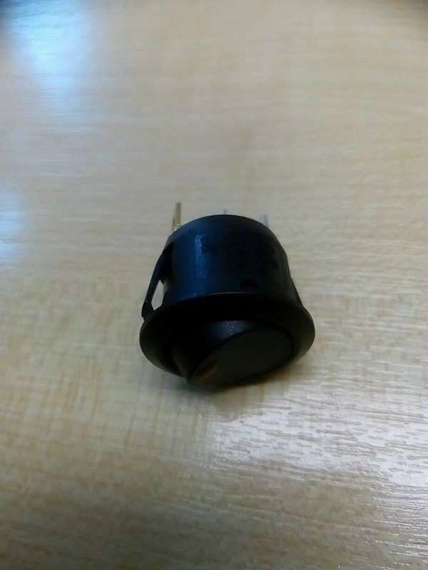 Kapcsoló 250V kerek piros világító Fekete