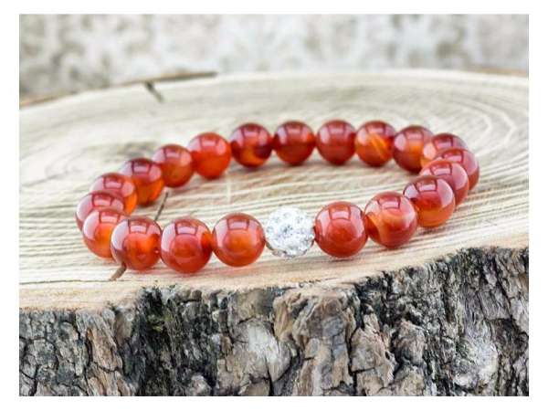 Karneol ásvány karkötő kristály gömbbel